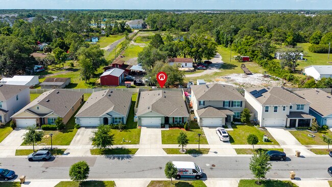 Building Photo - 4BR Under $2,300/mo | Tesla Charger | 15 Min to Lake Nona