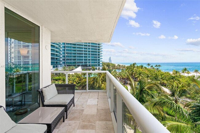 Building Photo - 10275 Collins Ave