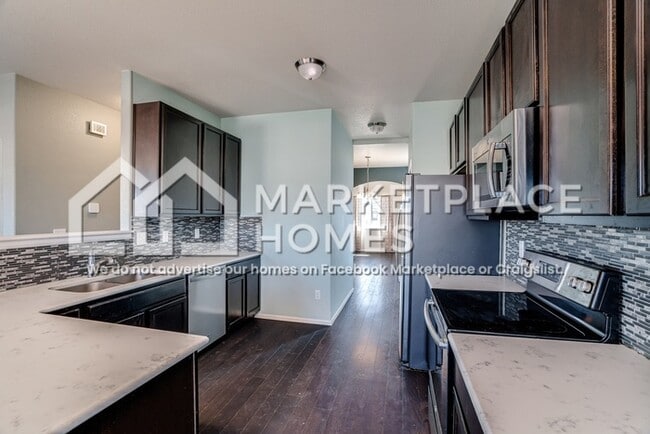 Building Photo - 9799 Desert Lily Cir