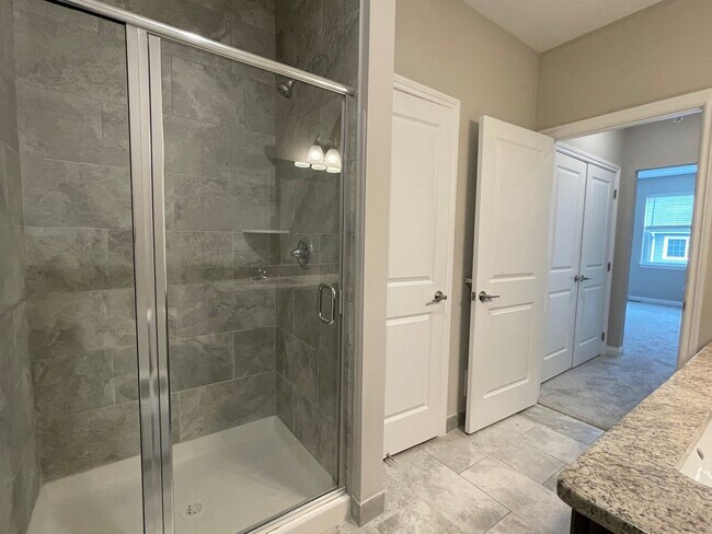 Building Photo - Shelby Township - 3 Bedroom, 2 Bath, End-Unit condo style w/Att Garage