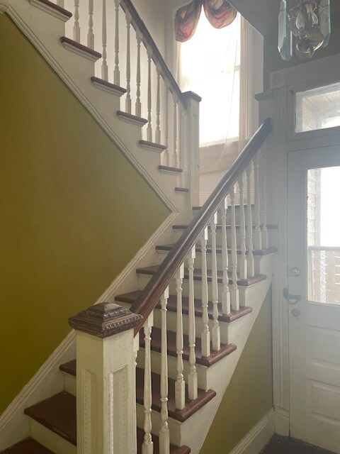 Staircase going upstairs. Side Entrance from the driveway. - 8226 Cohn St