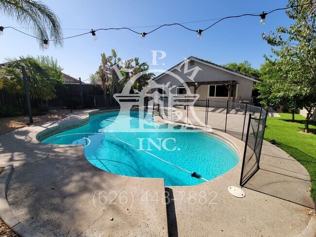 Building Photo - Modern Spacious 4-Bedroom Home with Pool i...
