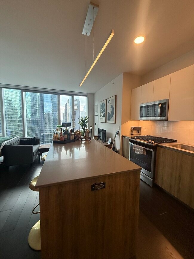 Building Photo - 313 W Wolf Point Plaza