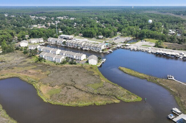 Building Photo - WATERFRONT LIVING! BEAUTIFULLY APPOINTED CONDO ON THE BAYOU IN OS SCHOOL DIST - FULLY FURNISHED