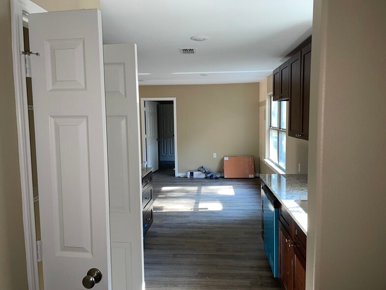 WALKING IN FROM THE CARPORT ENTRANCE - 612 Timberline Dr