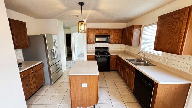 Building Photo - 5018 Woodland Meadows Ln