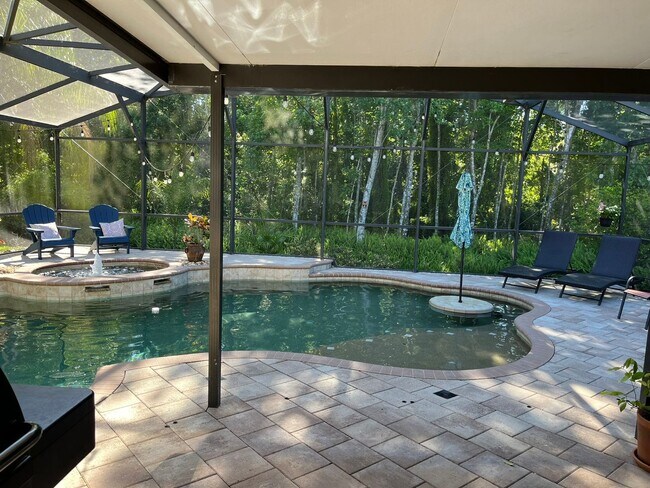 Building Photo - 5 Bedroom 3 Bath Lake Nona Santuary Availa...