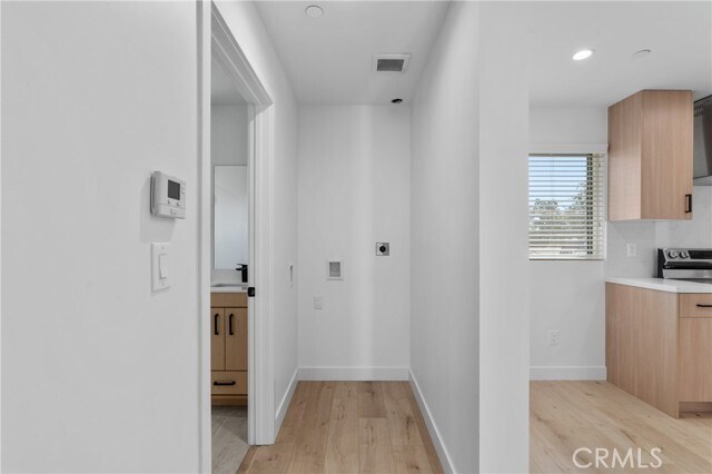 Building Photo - 11142 Woodley Ave