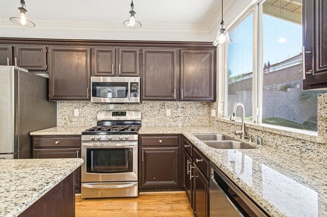 Building Photo - Beautiful 4-Bedroom Home with Pool & Rock Waterfall in 89002