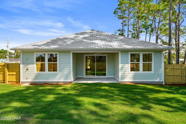 Building Photo - 7021 N Lagoon Dr