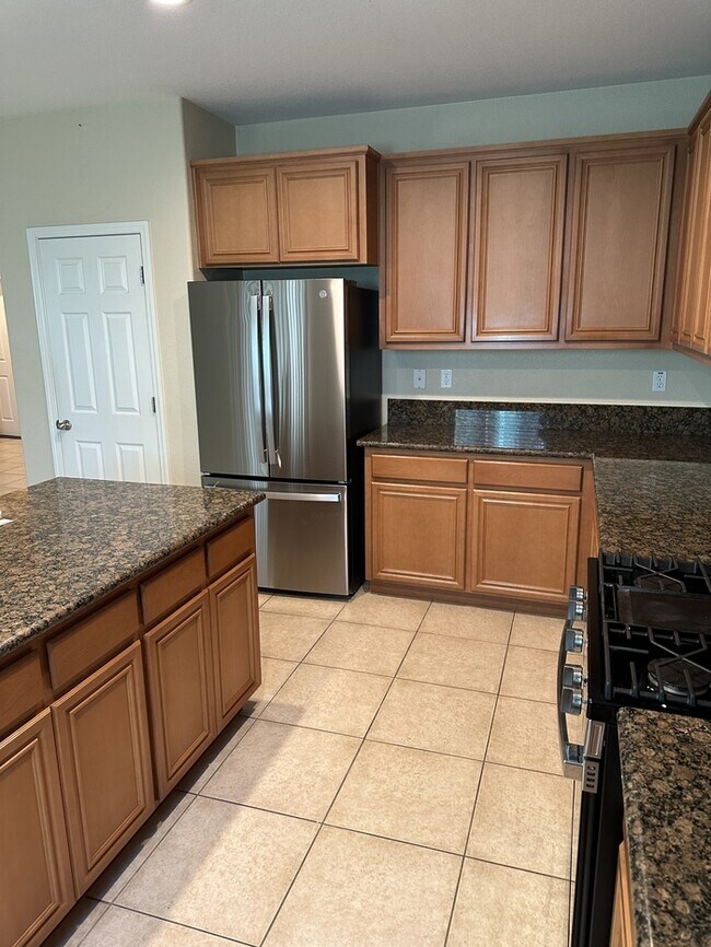 Building Photo - This stunning corner home offers 4 spaciou...