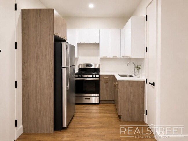 Building Photo - Modern Two-Bedroom with In-Unit Laundry and G Train Access — Available September 1