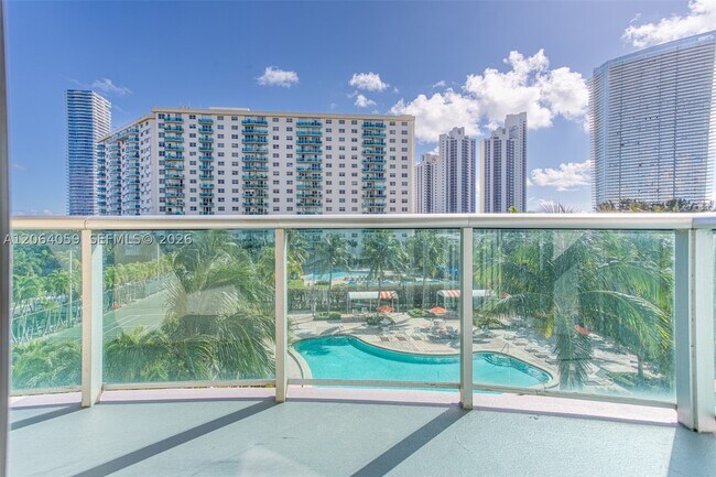 Building Photo - 19380 Collins Ave