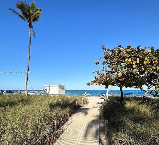Building Photo - 10275 Collins Ave