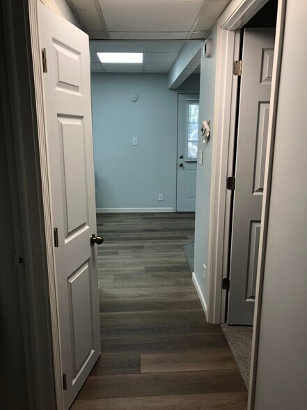 hallway looking toward kitchen - 306 E Henry St