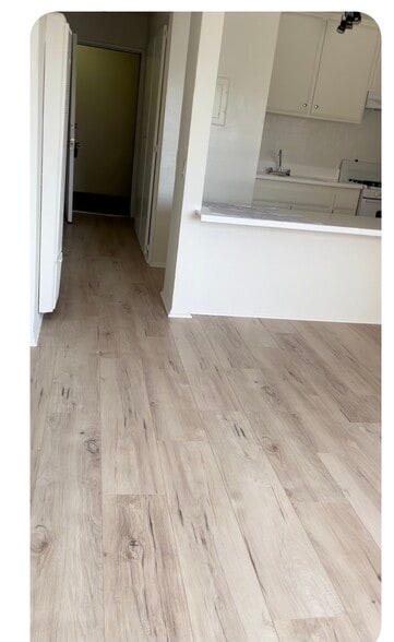 New flooring throughout - 7805 Reseda Blvd