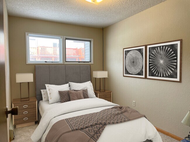 Main Floor Bed (virtual staging) - 501 Teller St