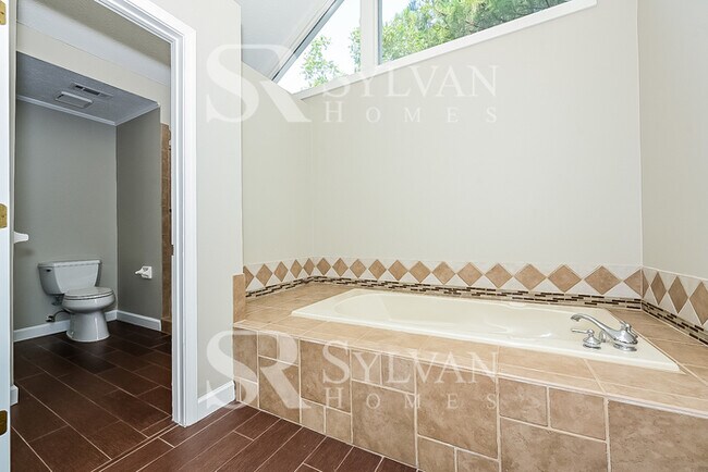 Building Photo - Turn the key. Enter. Smile. Repeat every day!