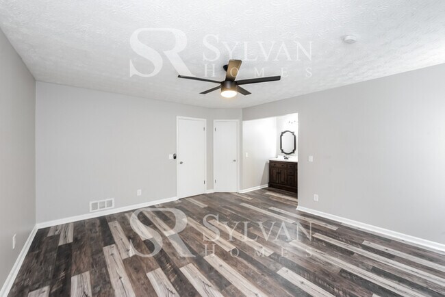 Building Photo - This lovely home is ready for your personal touch!