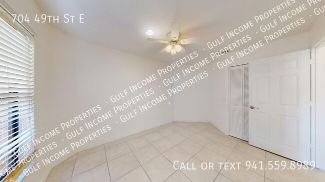 Building Photo - 704 49th St E