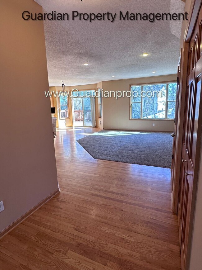 Building Photo - Brooklyn Park Single Family Home, Office, 3 Car Garage, New Carpet, Large Deck, Available Now
