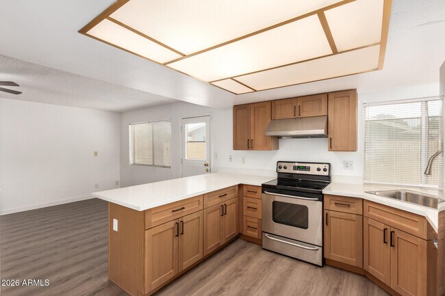 Building Photo - 5055 W Vogel Ave