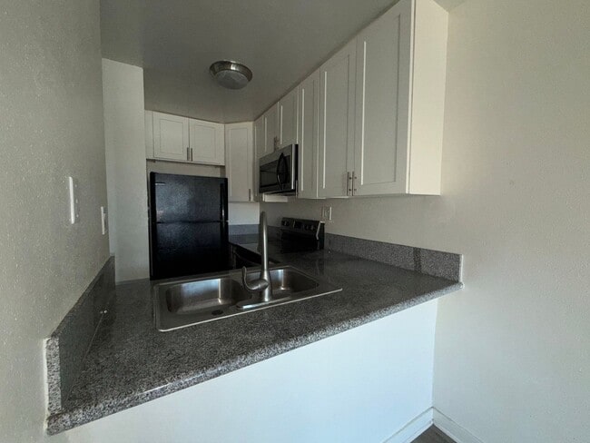 Building Photo - 9010 Tobias Ave