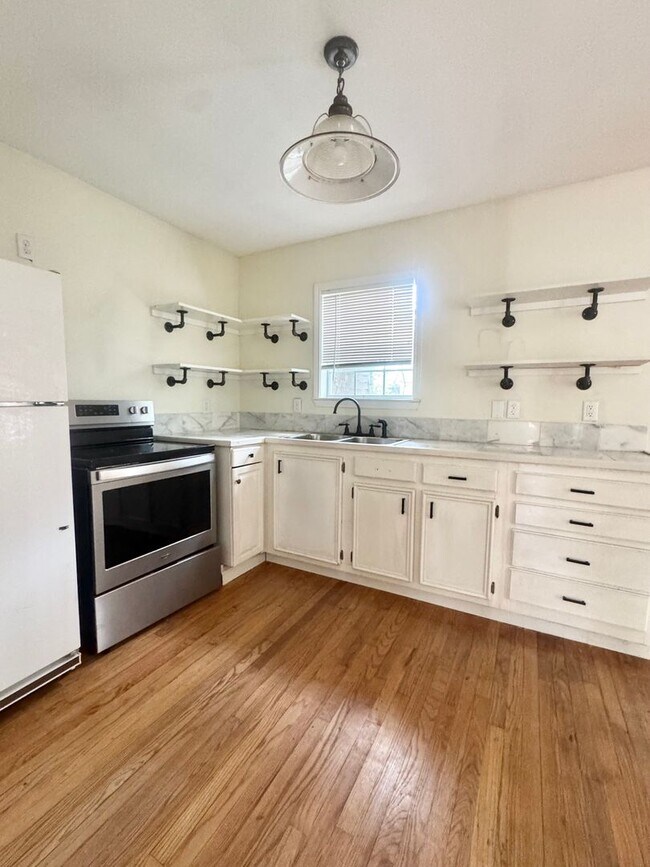 Building Photo - COMING APRIL 2026 - Charming Santa Rite Duplex! Yard Maintenance + Water/Sewer/Trash Included!