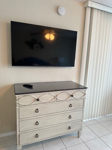 Brand new smart TV in master bedroom and living room - 9650 S Ocean Dr