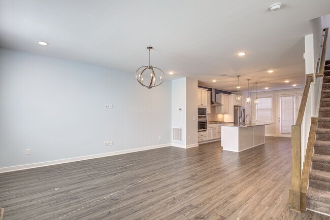 Building Photo - Corner Townhome with Roof Top Deck in Down...