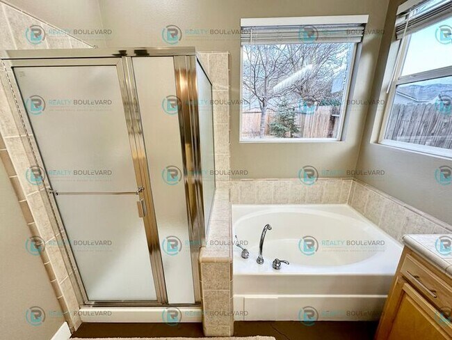 Building Photo - Open Kitchen, Expansive Living, and Covered Patio in Tranquil South Reno Near Trails, Parks & Sho...