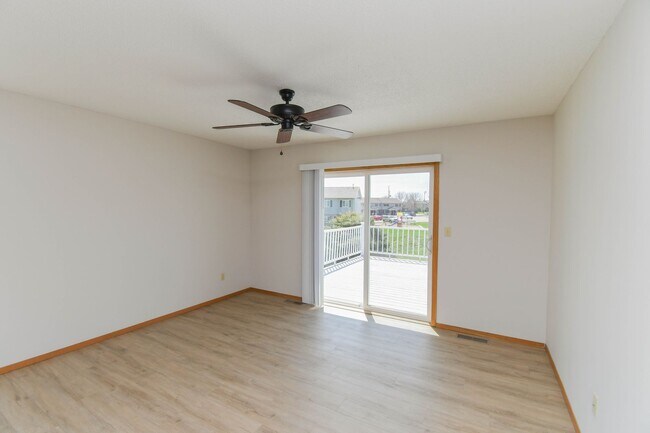 Building Photo - Updated 3BR Split-Level Home with Huge Deck, Fenced Yard & 2-Car Garage Near I-29!