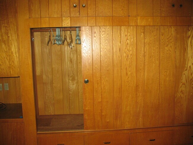 Sliding door closet with indoor paneling in closet - 3121 W Wyoming Ave
