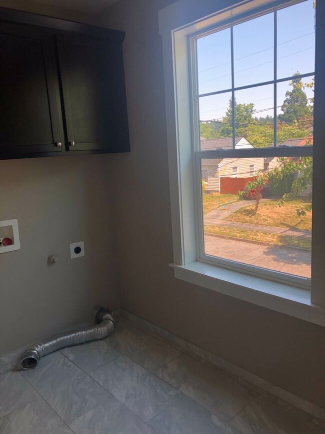 Building Photo - Beautiful New Home with Garage and Yard! A...