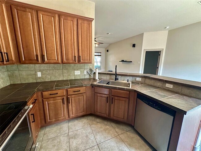 Building Photo - 15105 Cavalier Canyon Dr