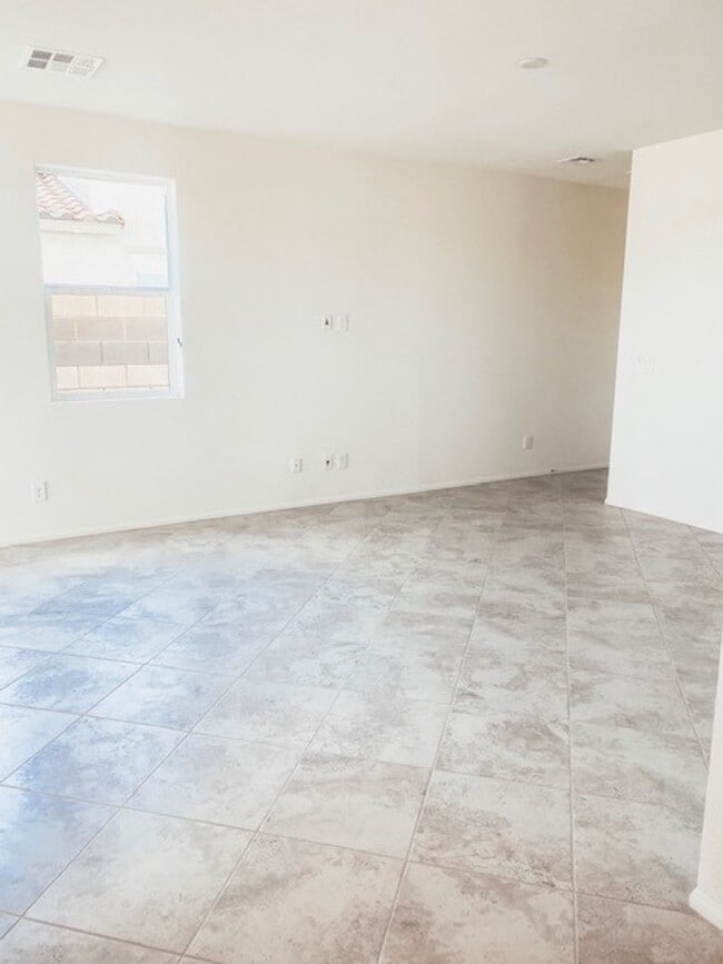 Building Photo - Beautiful Townhome in a Gated Community with 2-Car Garage!!