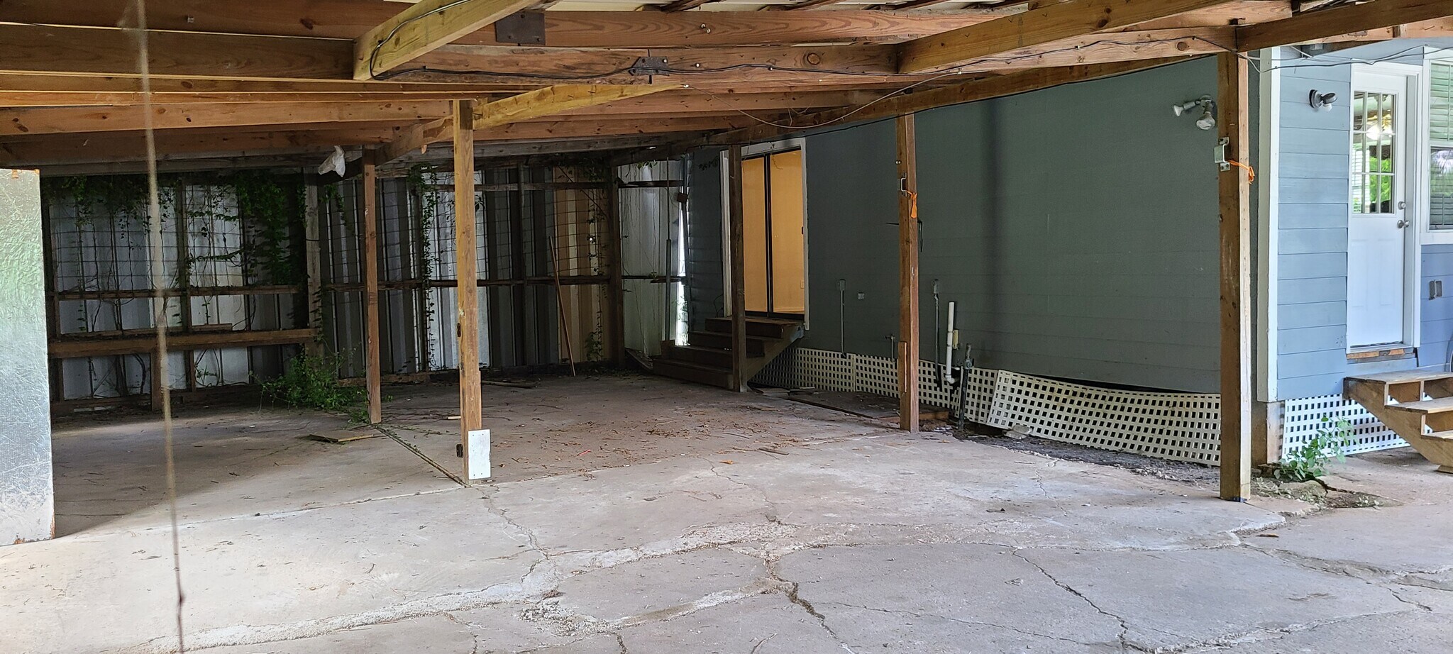 Primary bedroom has door to back patio - 8434 Garland St