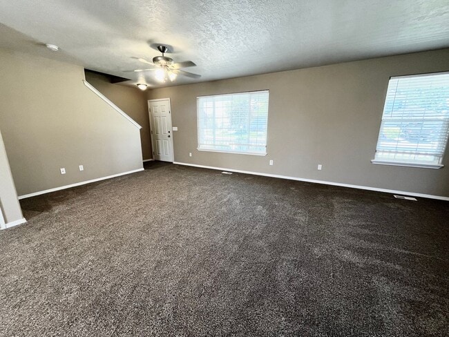 Building Photo - 4 Bedroom Home with Bonus Room Potential & RV Parking!