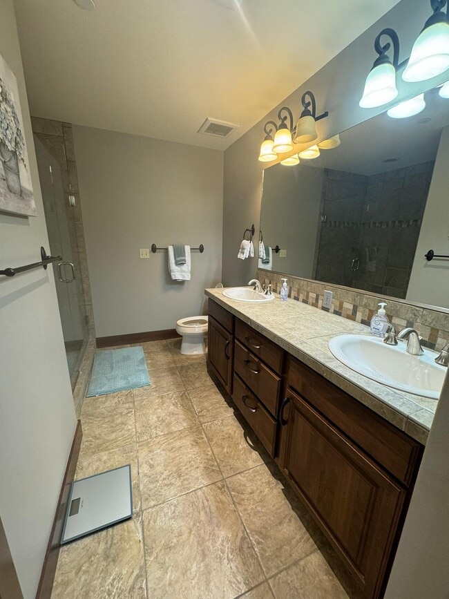 Building Photo - River Stone Condominium