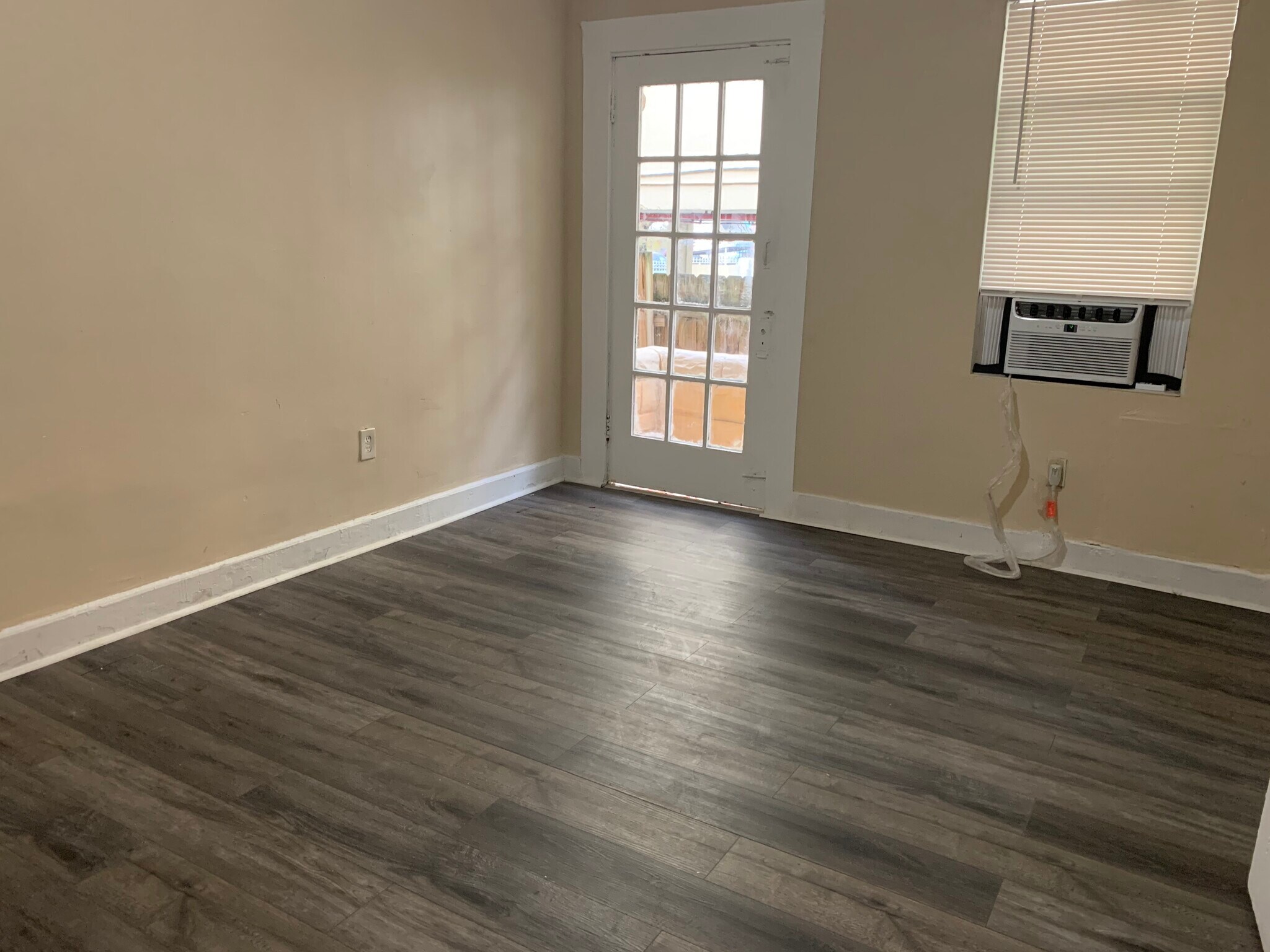 Bedroom with door to balcony - 1135 SW 6th St