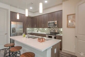 Building Photo - Experience the Art of Fine Apartment Living!
