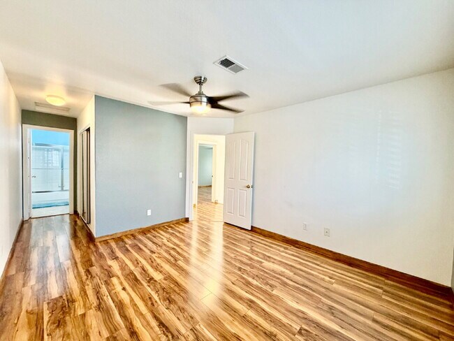 Building Photo - UPGRADED 2 BEDROOM TOWNHOME | SOLAR + PRIVATE YARD | SILVERADO RANCH / HENDERSON