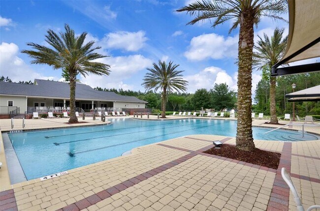 Building Photo - Spacious 4-Bedroom Home in Amelia Walk wit...