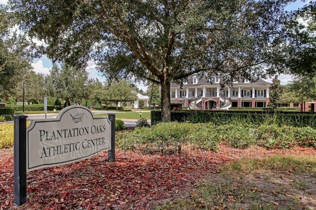 Building Photo - 4220 Plantation Oaks Blvd