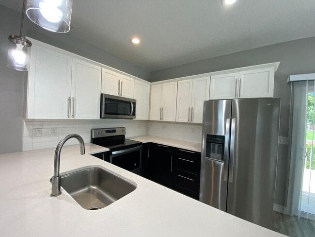 Building Photo - Beautiful and Unique Carriage House style home!