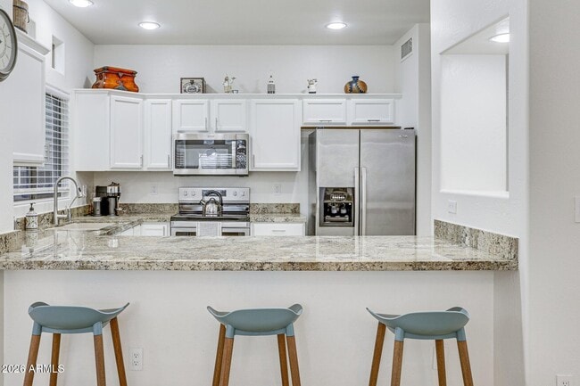 Building Photo - 9100 E Raintree Dr