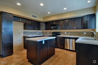 Building Photo - 5709 E Gelding Dr