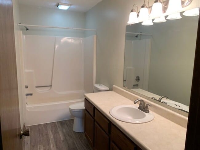 Building Photo - 2 BR, 1.5 BA Clive split level duplex.  Deck and one car attached garage.