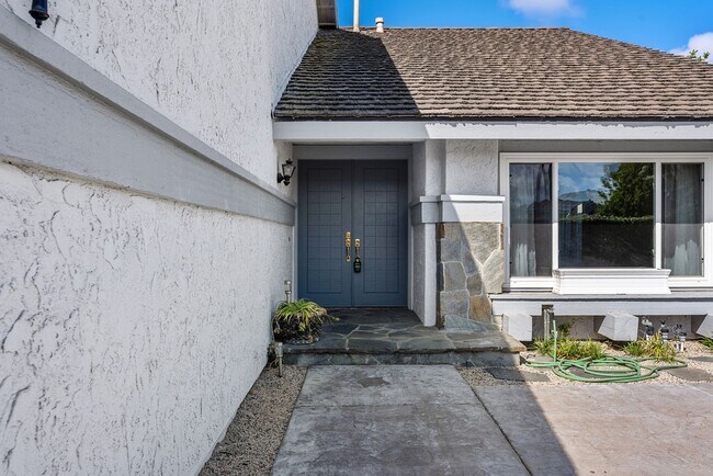 Building Photo - Coastal Elegance Meets Family Comfort in D...