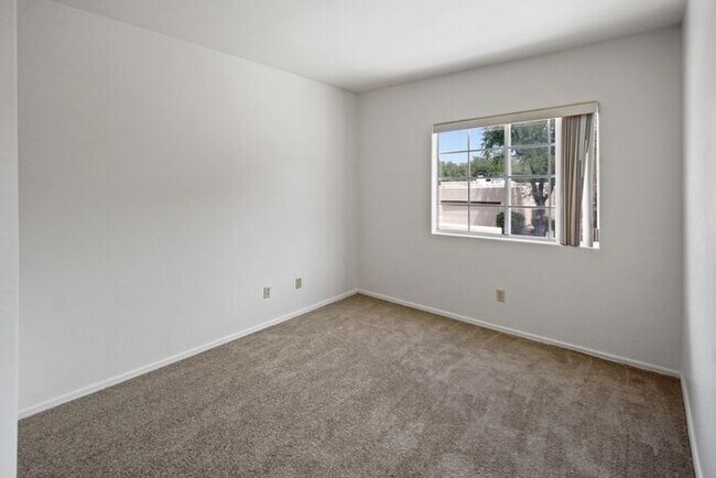 Building Photo - Elegant 4-Bed Home with Balcony & Backyard...